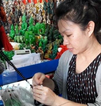 Thai-buddhist prayer bead mala necklace being made